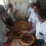 Students making pizza